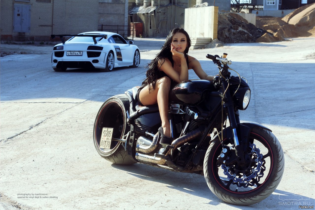 Sexy model Brunettes on a motorcycle in Praia