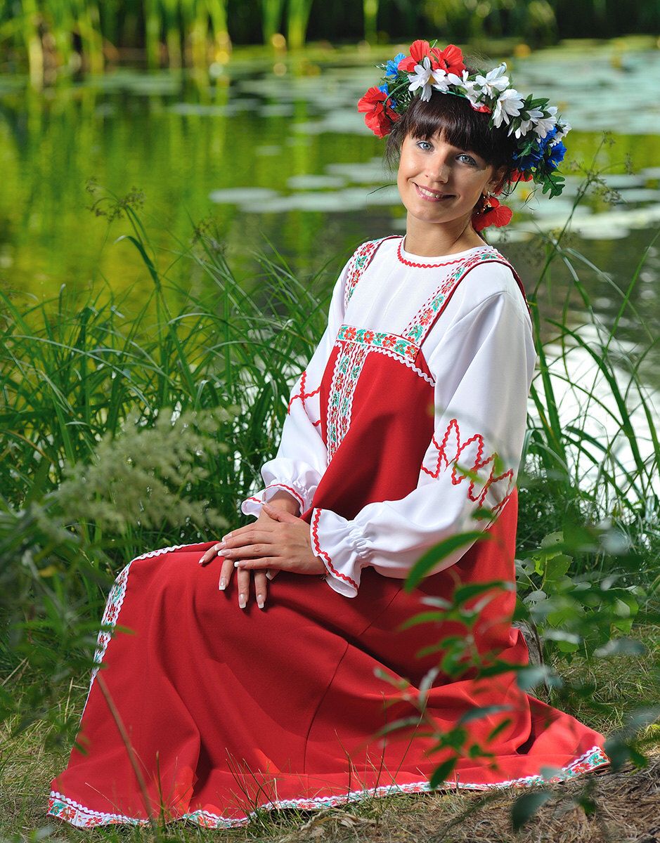 Beautiful girl Girls in Slavic costumes in Praia